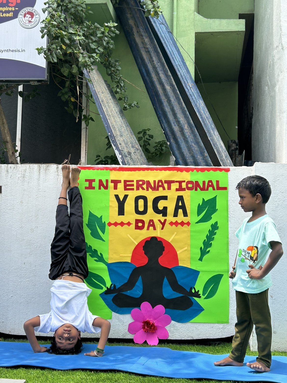 Children participating in International Yoga Day activity at PB Kids International Play School